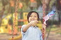 Happy little girl waving American flag Royalty Free Stock Photo