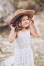 little girl wearing a hat outdoors Royalty Free Stock Photo