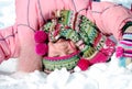 Happy little girl in winter clothing upside down Royalty Free Stock Photo