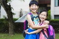 Happy little girls with classmates having fun at the School Royalty Free Stock Photo