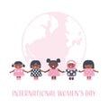 Happy little girls holding hands on the globe background. International Women\'s Day concept Royalty Free Stock Photo