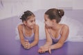 Two little ballerinas talking after dancing lesson Royalty Free Stock Photo