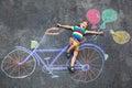 Little kid boy having fun with bike chalks picture Royalty Free Stock Photo