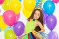 Happy little kid girl with colorful balloons on Royalty Free Stock Photo