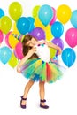 Happy little kid girl with colorful balloons on Royalty Free Stock Photo