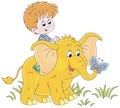 Happy little kid riding on a funny baby elephant Royalty Free Stock Photo