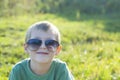 Happy little kid in sunglasses Royalty Free Stock Photo