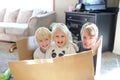 Happy Little Kids Playing in Cardboard Box Royalty Free Stock Photo