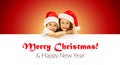 Happy little kids in Santa hat peeking from behind Royalty Free Stock Photo