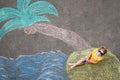 Happy little preschool girl in swimsuit on inflatable ring with sea, sand, palm painted with colorful chalks on asphalt