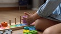 Happy Little Preschool Toothless Girl Playing With Colored Wooden Toy. Kids Learn To Count By Playing Teaches Numbers At Royalty Free Stock Photo