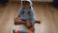 Happy Little Preschool Toothless Girl Playing With Colored Wooden Toy. Kids Learn To Count By Playing Teaches Numbers At Royalty Free Stock Photo