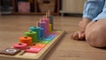 Happy Little Preschool Toothless Girl Playing With Colored Wooden Toy. Kids Learn To Count By Playing Teaches Numbers At Royalty Free Stock Photo