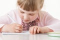 Happy little school girl learning to write Royalty Free Stock Photo