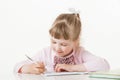 Happy little school girl learning to write Royalty Free Stock Photo
