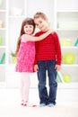 Little sister hugging her brother Royalty Free Stock Photo