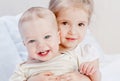 Happy little sister hugging her brother Royalty Free Stock Photo