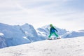 Happy little skier riding down the slope Royalty Free Stock Photo