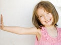 Happy little smiling girl leaning Royalty Free Stock Photo