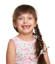Happy lost tooth girl portrait, studio shoot on white background
