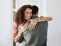 Happy, love and a couple hugging in their home for support, care or romance in marriage together. Smile, trust and Royalty Free Stock Photo