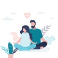 Happy love couple sitting in lotus yoga pose. Beauty pregnant woman and handsome man doing asana Royalty Free Stock Photo