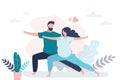 Happy love couple standing in yoga pose. Beauty pregnant woman and handsome man doing asana Royalty Free Stock Photo