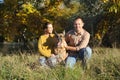 Happy love couple with their german shepherd dog, young family portrait Royalty Free Stock Photo