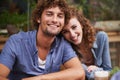 Happy, love and portrait of couple at coffee shop on romantic, anniversary or morning date. Smile, positive and young Royalty Free Stock Photo