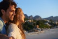 Happy, love and young couple at beach on vacation, adventure or holiday for valentines day. Smile, travel and man and Royalty Free Stock Photo