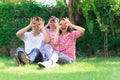 Happy lovely beautiful Asian family father, mother and son playing together at home garden. Smiling parent and cheerful kid relax Royalty Free Stock Photo