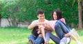 Happy lovely beautiful Asian family father, mother and son playing together at home garden. Smiling parent and cheerful kid relax Royalty Free Stock Photo