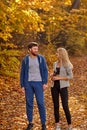 Happy lovely couple enjoying walk in the forest, have talk Royalty Free Stock Photo