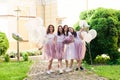 Happy lovely girlfriends at hen party in the summer outdoors