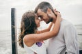 Happy lovers have a romantic time on sea beach Royalty Free Stock Photo