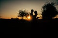 Happy lovers have a romantic time on sunset Royalty Free Stock Photo