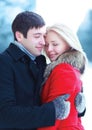 Happy lovers young couple hugging in winter Royalty Free Stock Photo