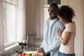 Happy biracial couple enjoy romantic date together Royalty Free Stock Photo