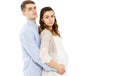 Happy Loving Couple Awaiting The Birth Of Child Posing On A White Background Royalty Free Stock Photo