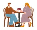 Happy loving couple on a date in a restaurant, having dinner and drinking red wine. Royalty Free Stock Photo