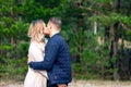 Happy loving couple enjoying of happiness love and tenderness, dating, romance.Couple hugging in love at spring park Royalty Free Stock Photo