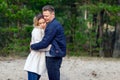 Happy loving couple enjoying of happiness love and tenderness, dating, romance.Couple hugging in love at spring park Royalty Free Stock Photo