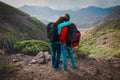 Happy loving couple hiking travel in mountains Royalty Free Stock Photo