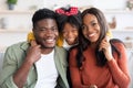 Happy Loving Family. Black Mom, Dad And Little Daughter Posing At Home Royalty Free Stock Photo