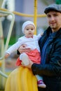 Happy loving family. Father and his daughter child girl playing and hugging outdoors. Cute little girl hugs daddy. Concept of Royalty Free Stock Photo