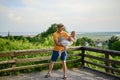 Happy loving family. Father and his daughter child girl playing and hugging outdoors. Cute little girl hugs daddy. Concept of