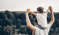 Loving family. Father and his son baby boy playing and hugging outdoors. Happy dad and son outdoors. Concept of Father`s day. Royalty Free Stock Photo