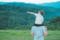 Happy loving family. Father and his son baby boy playing and hugging outdoors. Royalty Free Stock Photo