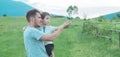 Happy loving family. Father and his son baby boy playing and hugging outdoors. Royalty Free Stock Photo