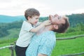 Happy loving family. Father and his son baby boy playing and hugging outdoors. Royalty Free Stock Photo